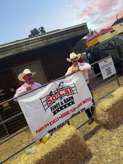 SoCal Fence and Barn heavy-duty corral panels with company banners set up at the San Bernardino County Sheriff's Rodeo arena in Glen Helen
